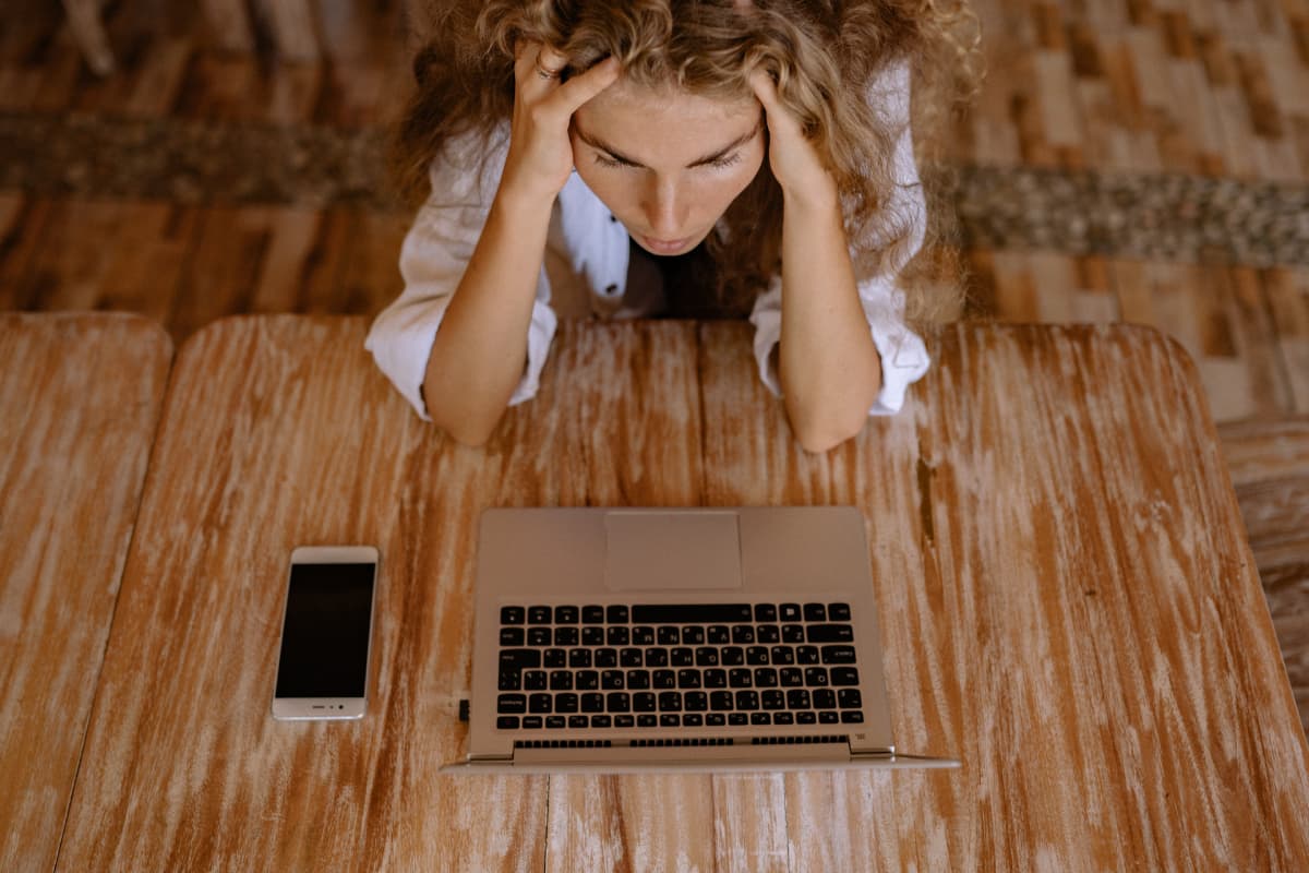 woman sitting infront of laptop 