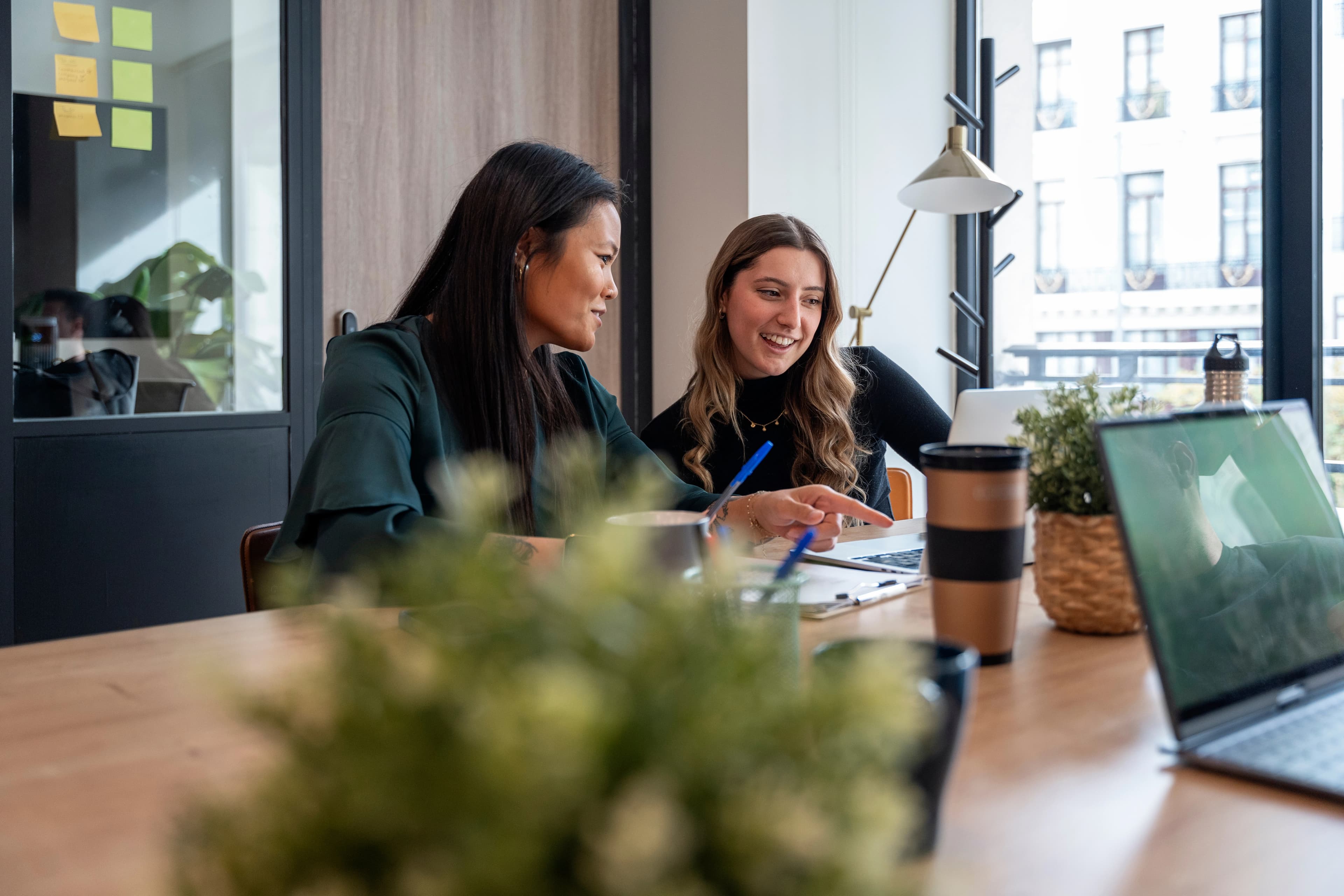 Women sharing a laptop